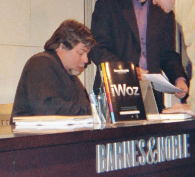 Woz signing away